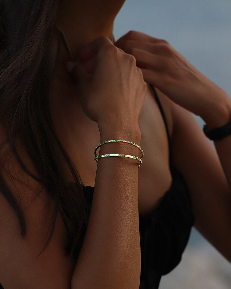 A Bangle in 14k gold-plated 316L stainless steel from Waldor & Co. One size. The model is Dulcet Bangle Polished.